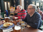 Eddie and Jack, with beer festival poster alongside.